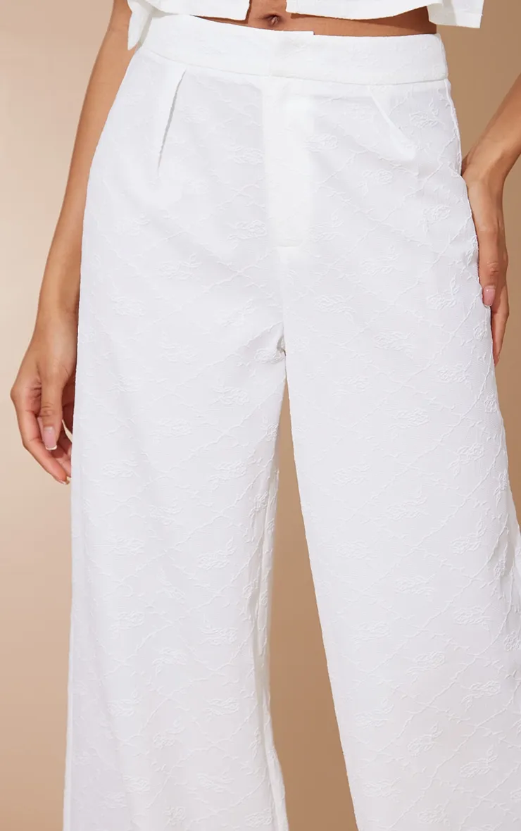 Pantalon de tailleur blanc taille haute à fleurs en jacquard